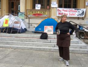 Protesters encamped on the steps of the Berekely post office