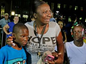A woman responds to the verdict in the Zimmerman trial