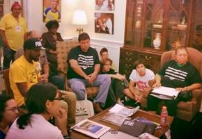 Dream Defenders speak with farmworkers and other activists during a "people's session" in the Capitol