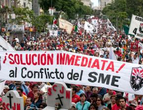 Electrical workers and teachers join in a mass march in Mexico City