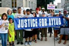 Supporters of Ayyub Abdul-Alim gather for a rally before a court date