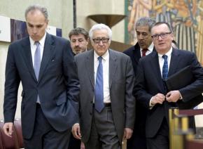 Lakhdar Brahimi and other UN officials arrive at negotiations in Geneva, Switzerland