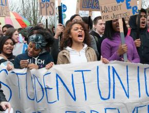 Jefferson High School students march through the streets of Portland after walking out