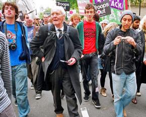 Tony Benn (second from left) marching against war in London