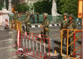 Thai soldiers guard their barricades in Bangkok