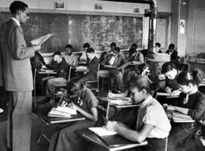 Students study in an all-Black segregated school