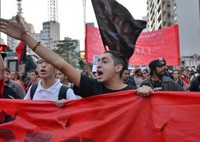 Protesters march in São Paulo to defend fired transit workers and the right to demonstrate during the World Cup