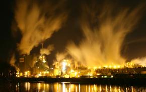Air pollution rising from an industrial complex