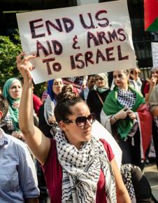 Protesters rally against the ongoing Israeli assault on Gaza