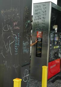 Grafitti at the QuikTrip in the center of Ferguson, Mo.