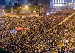 Masses of people fill the streets of the Central district in Hong Kong