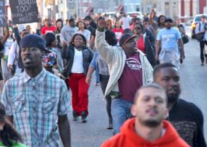 Baltimore residents on the march to demand justice for Freddie Gray