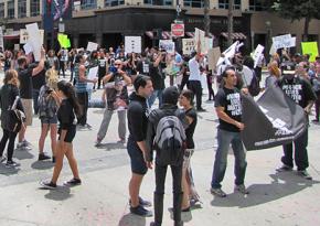 Demonstrators against police violence take to the streets in Long Beach, California