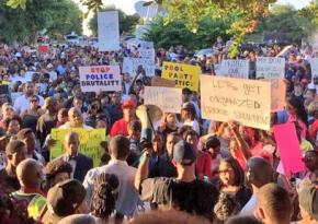 Hundreds of people fill the streets in McKinney, Texas, to protest police brutality