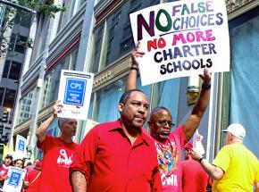 Chicago teachers picket the Board of Education to protest its manufactured budget crisis