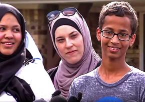 Ahmed Mohamed (right) at a press conference after his story became known