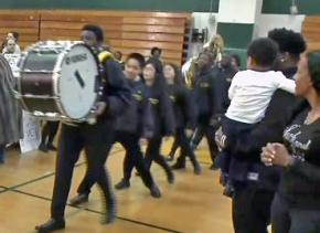 A marching band joins in the celebration of Martin Luther King Day at Ramapo High School