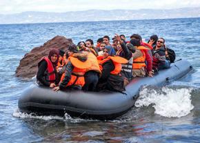 Refugees arrive at a Greek island