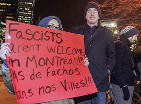 Protesters in Quebec stand against Marine Le Pen of France's National Front