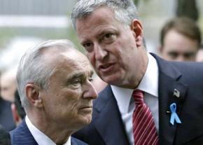 New York City Mayor Bill de Blasio (right) talks to Police Commissioner William Bratton