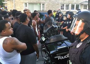 Protesters confront police following the murder of Sylville Smith