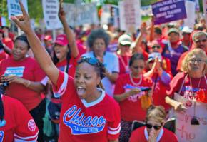 Chicago teachers march with thousands of supporters during their strike