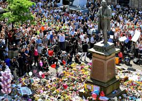 Thousands gather for a vigil in Manchester's St. Ann's Square