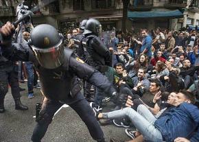 Police attack independence supporters protesting in Catalonia