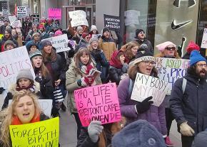 Pro-choice activists rally against the anti-abortion "March for Life" in Chicago