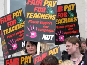 Members of Britain's National Union of Teachers hold a day of action for fair pay