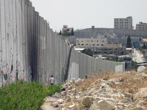 The Israeli apartheid wall cuts through the Aida refugee camp in the West Bank