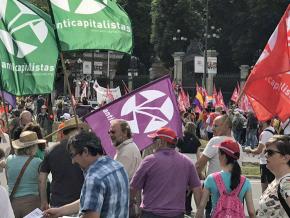 Anticapitalistas take part in a demonstration against state repression in Catalonia