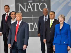 Donald Trump poses with other heads of state at the 2018 NATO summit