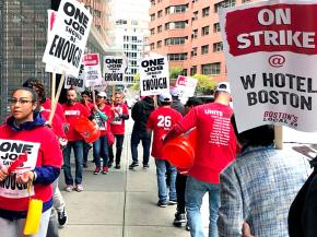 Striking hotel workers walk the picket line in Boston