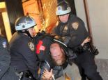 Police arrest a protester during demonstrations on the six-month anniversary of Occupy Wall Street Police arrest a protester during demonstrations on the six-month anniversary of Occupy Wall Street