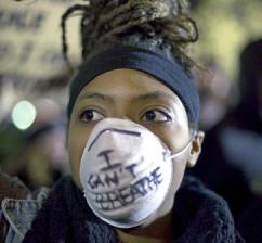 Protester against the non-indictment of NYPD officer Daniel Pantaleo for the murder of Eric Garner (Joshua Sinn) Protester against the non-indictment of NYPD officer Daniel Pantaleo for the murder of Eric Garner (Joshua Sinn)
