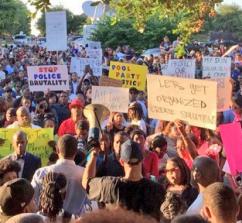 Hundreds of people fill the streets in McKinney, Texas, to protest police brutality