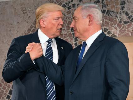 Donald Trump greets Prime Minister Benjamin Netanyahu during a visit to Israel