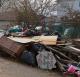Debris piled outside storm-damaged homes on Staten Island (John De Guzmán) Debris piled outside storm-damaged homes on Staten Island (John De Guzmán)