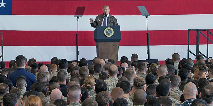 Donald Trump delivers an address at the Yokota Air Base in Japan