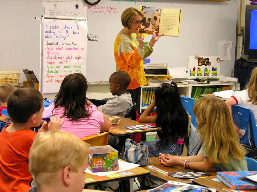 An elementary school teacher leads a guided reading lesson