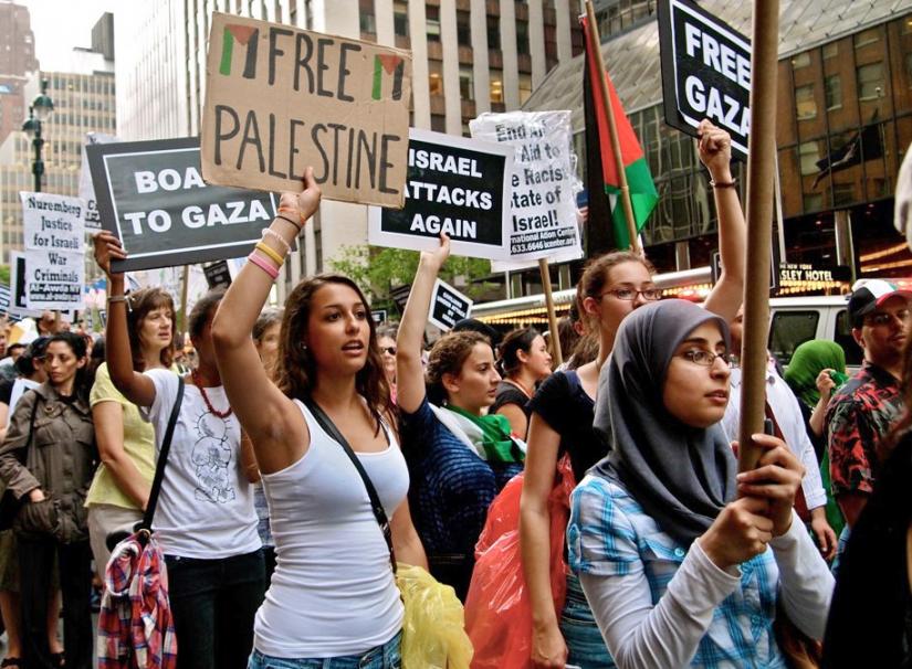 Protesters march in New York City for an end to the siege of Gaza following Israel's massacre on the Mavi Marmara