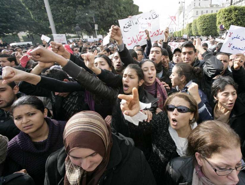 Tunisian protesters call for leaders of the former ruling party to be excluded from the new government