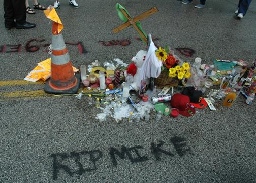 A shrine for Mike Brown on the street where he was killed in Ferguson