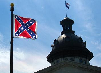 The Confederate flag flying on the grounds of the South Carolina Capitol building