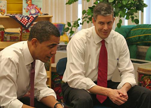 Chicago Public Schools CEO Arne Duncan (right) visits a classroom with Barack Obama