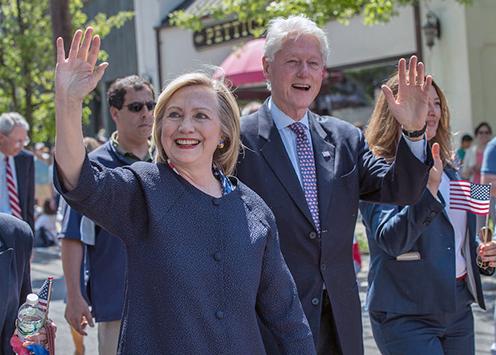 Hillary Clinton on the campaign trail, with Bill Clinton accompanying her