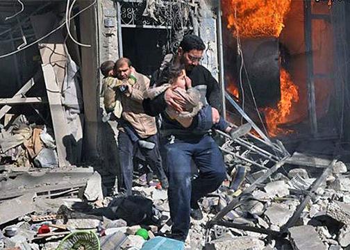 Residents of Aleppo rescue children from a burning house after another air strike