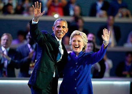 Hillary Clinton and Barack Obama on stage at the Democratic National Convention