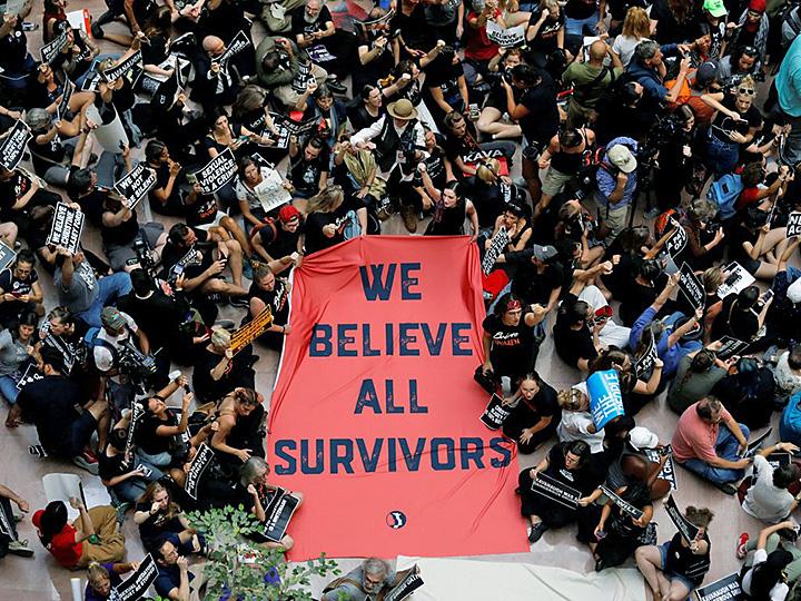 Protesters stage a sit-in against Kavanaugh's nomination on Capitol Hill